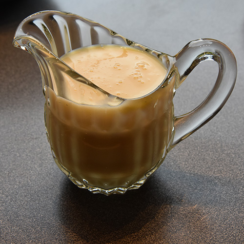 Vaniljesaus (mormor enkle) Ingredienser: 5 dl Melk 2 Egg 1 ts Potetmel 1 ss Vaniljesukker 1 ss Sukker