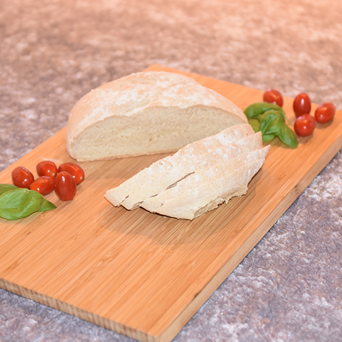 Italiensk Landbrød Ingredienser: Surdeig: 2 dl Melk 2 ts Honning 7 g Gjær (1 ts tørrgjær) 125 g Hvetemel Deig: 7 g Gjær (1 ts tørrgjær) 2 ½ dl Vann 2 ½ ts Salt Ca. 500 g Hvetemel